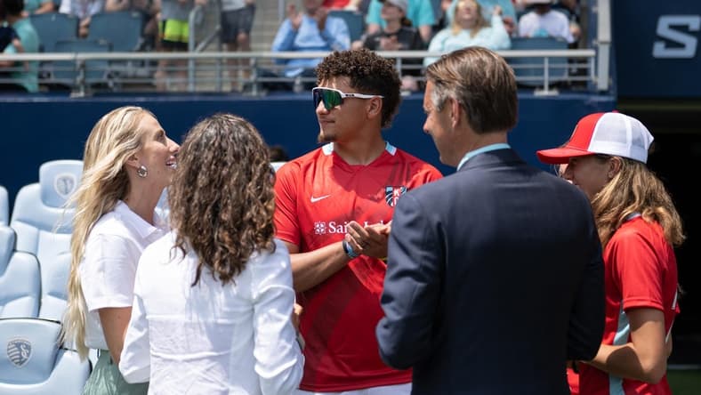 May 30, 2022; Kansas City, Kansas, USA; Kansas City Chiefs quarterback Patrick Mahomes talks with Kansas City Current owners, his wife Brittany and Chris and Angie Long, before a match against Racing Louisville FC at Children's Mercy Park. Mandatory Credit: Amy Kontras-USA TODAY Sports