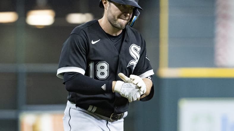 Jun 17, 2022; Houston, Texas, USA; Chicago White Sox left fielder AJ Pollock (18) rounds the bases and reacts after hitting a three run home run against the Houston Astros in the third inning at Minute Maid Park. Mandatory Credit: Thomas B. Shea-USA TODAY Sports