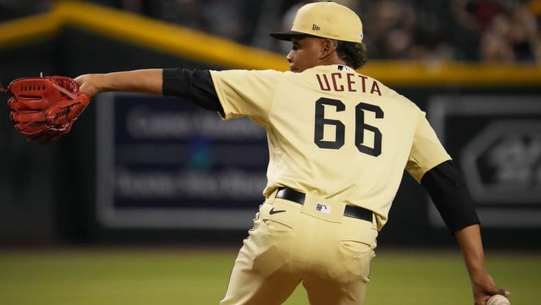 Jul 22, 2022; Phoenix, Arizona, USA; Arizona Diamondbacks relief pitcher Edwin Uceta (66) pitches against the Washington Nationals during the ninth inning at Chase Field. Mandatory Credit: Joe Camporeale-USA TODAY Sports