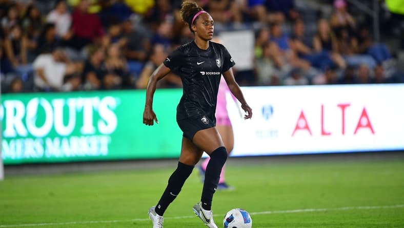 Aug 10, 2022; Los Angeles, CA, USA; Angel City FC defender Allyson Swaby (25) controls the ball against Tigres UANL during the second half of an international friendly at Banc Of California Stadium. Mandatory Credit: Gary A. Vasquez-USA TODAY Sports