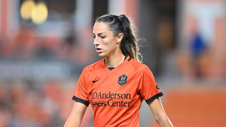 Aug 12, 2022; Houston, Texas, USA; Houston Dash forward Ryan Gareis (21) reacts to a play during the second half against Racing Louisville FC at PNC Stadium. Mandatory Credit: Maria Lysaker-USA TODAY Sports