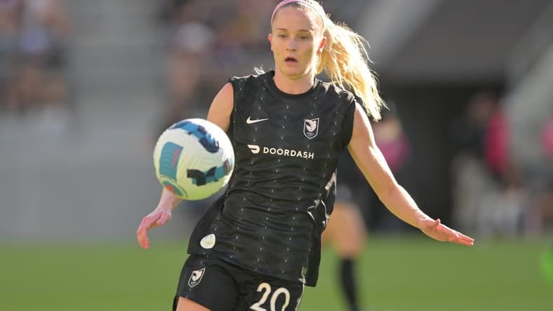 Aug 14, 2022; Los Angeles, California, USA; Angel City FC forward Tyler Lussi (20) looks to control the ball in the first half against the Chicago Red Stars at Banc of California Stadium. Mandatory Credit: Jayne Kamin-Oncea-USA TODAY Sports