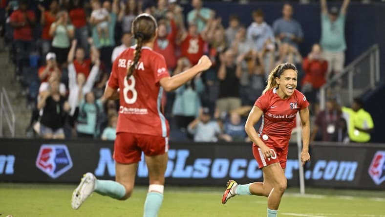 Aug 19, 2022; Kansas City, Kansas, USA; Kansas City Current midfielder Lo'Eau Labonta (10) celebrates scoring a goal during the second half against Angel City FC at Children's Mercy Park. Mandatory Credit: Amy Kontras-USA TODAY Sports