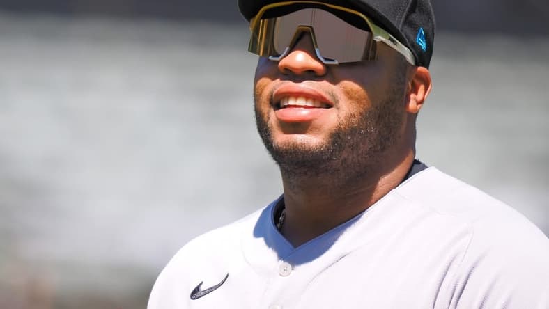 Aug 24, 2022; Oakland, California, USA; Miami Marlins first baseman Jesus Aguilar (99) returns to the dugout after the second inning at RingCentral Coliseum. Mandatory Credit: Kelley L Cox-USA TODAY Sports
