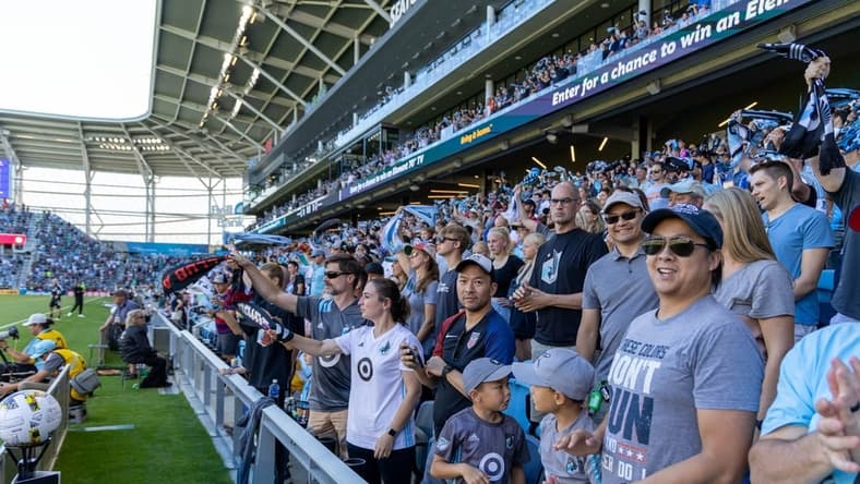 Sep 3, 2022; Saint Paul, Minnesota, USA; Minnesota United fans wave their scarves as their team has a corner kick in the first half against FC Dallas at Allianz Field. Mandatory Credit: Matt Blewett-USA TODAY Sports