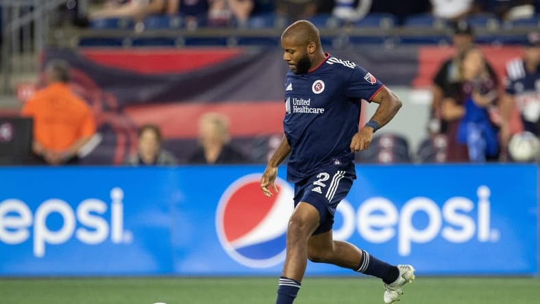 Aug 31, 2022; Foxborough, Massachusetts, USA; New England Revolution defender Andrew Farrell (2) passes the ball during the first half against the Chicago Fire FC at Gillette Stadium. Mandatory Credit: Paul Rutherford-USA TODAY Sports