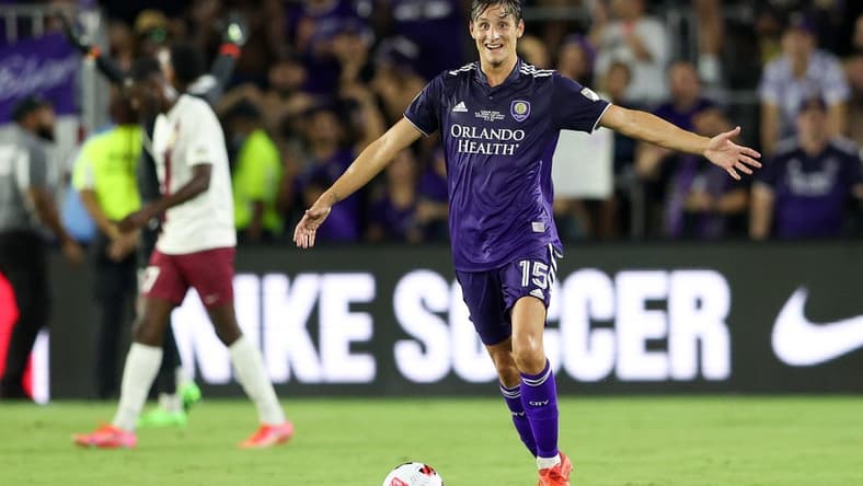 Sep 7, 2022; Orlando, Florida, US; Orlando City defender Rodrigo Schlegel (15) celebrates after beating Sacramento Republic in the US Open Cup Final at Exploria Stadium. Mandatory Credit: Nathan Ray Seebeck-USA TODAY Sports