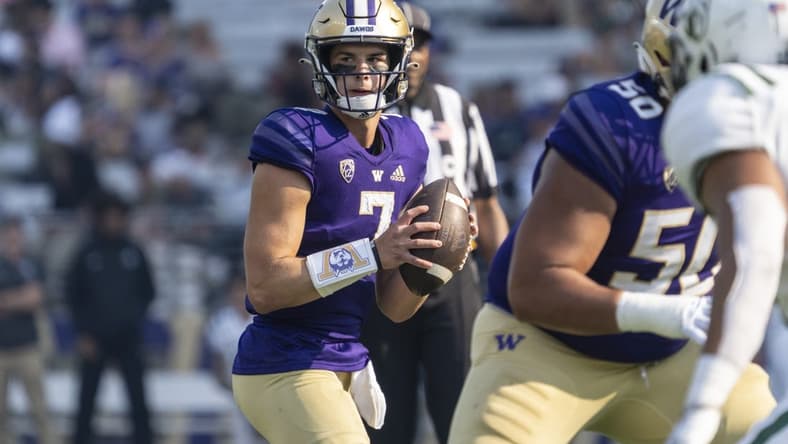 Sep 10, 2022; Seattle, Washington, USA; Washington Huskies quarterback Sam Huard (7) looks to pass during the second half against the Portland State Vikings at Alaska Airlines Field at Husky Stadium. Mandatory Credit: Stephen Brashear-USA TODAY Sports