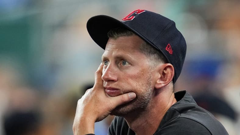 Sep 6, 2022; Kansas City, Missouri, USA; Cleveland Guardians assistant coach Kyle Hudson watches the action during the eighth inning against the Kansas City Royals at Kauffman Stadium. Mandatory Credit: Jay Biggerstaff-USA TODAY Sports