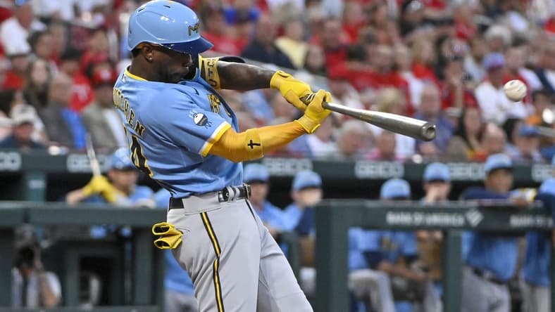 Sep 13, 2022; St. Louis, Missouri, USA; Milwaukee Brewers designated hitter Andrew McCutchen (24) hits a one run double against the St. Louis Cardinals during the first inning at Busch Stadium. Mandatory Credit: Jeff Curry-USA TODAY Sports