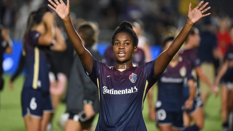 Sep 14, 2022; Cary, North Carolina, USA; North Carolina Courage midfielder Brianna Pinto (5) waves to fans after a match against the Angel City FC at WakeMed Soccer Park. Mandatory Credit: Rob Kinnan-USA TODAY Sports