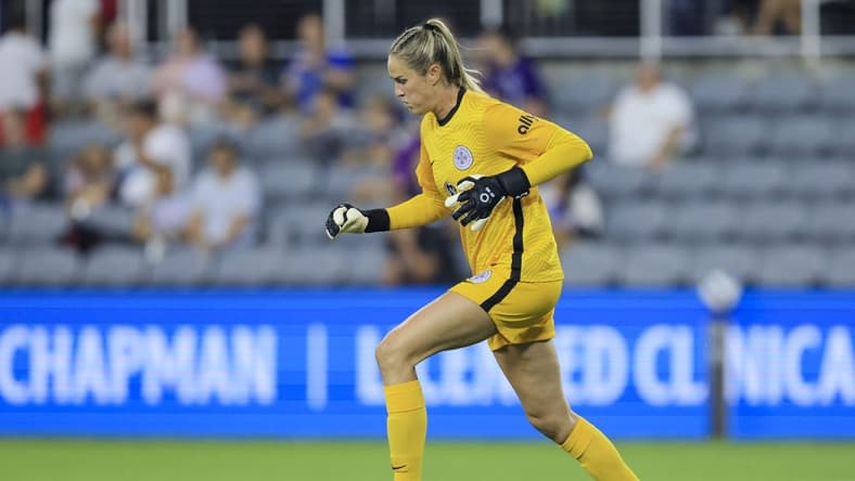 Sep 16, 2022; Louisville, Kentucky, USA; Racing Louisville FC goalkeeper Katie Lund (1) dribbles against Orlando Pride in the first half at Lynn Family Stadium. Mandatory Credit: Aaron Doster-USA TODAY Sports