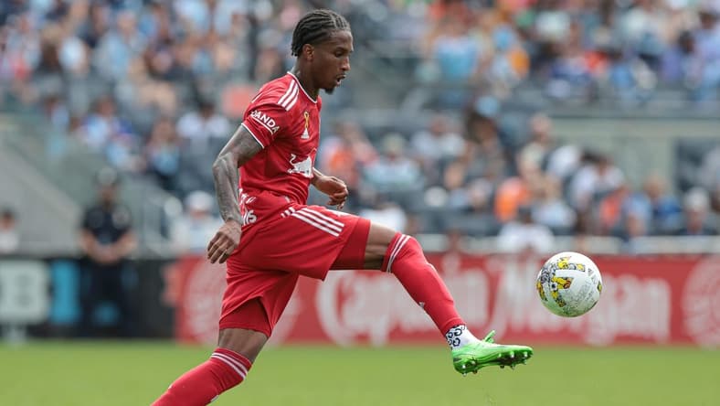 Sep 17, 2022; New York, New York, USA; New York Red Bulls defender Kyle Duncan (6) plays the ball against New York City FC during the second half at Yankee Stadium. Mandatory Credit: Vincent Carchietta-USA TODAY Sports