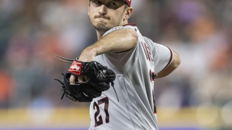 Sep 27, 2022; Houston, Texas, USA; Arizona Diamondbacks starting pitcher Zach Davies (27) pitches against the Houston Astros  in the second inning at Minute Maid Park. Mandatory Credit: Thomas Shea-USA TODAY Sports