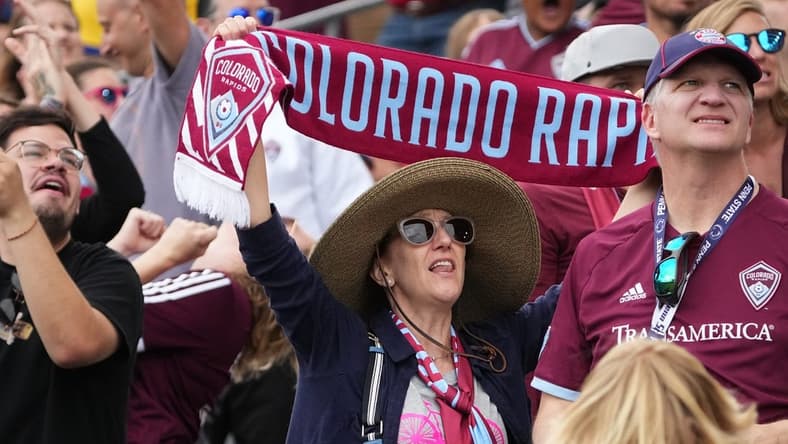 Oct 1, 2022; Commerce City, Colorado, USA; Colorado Rapids fans cheer following a goal in the second half against FC Dallas at Dick's Sporting Goods Park. Mandatory Credit: Ron Chenoy-USA TODAY Sports