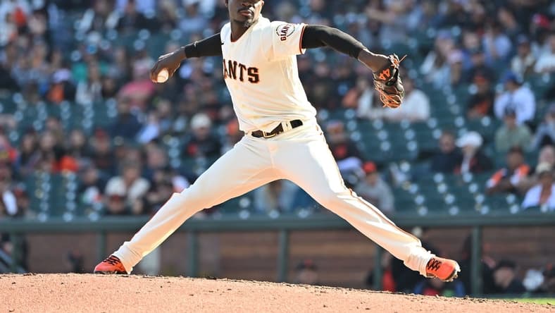 Oct 1, 2022; San Francisco, California, USA; San Francisco Giants relief pitcher Yunior Marte (74) throws against the Arizona Diamondbacks during the eighth inning at Oracle Park. Mandatory Credit: Robert Edwards-USA TODAY Sports