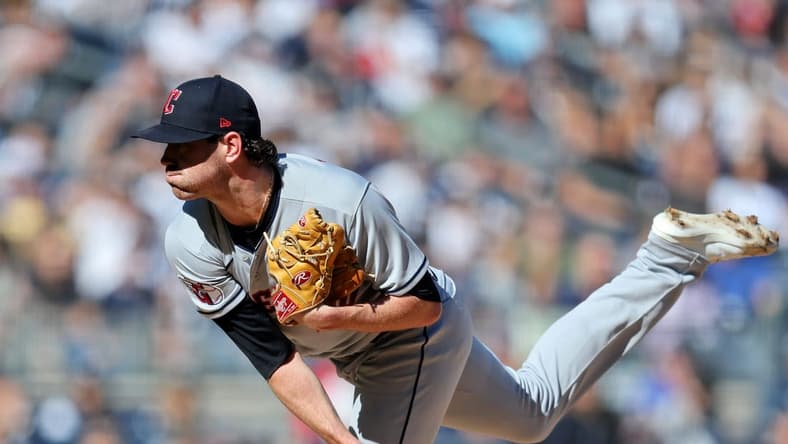 Oct 14, 2022; Bronx, New York, USA; Cleveland Guardians starting pitcher Shane Bieber (57) pitches against the New York Yankees during the third inning in game two of the ALDS for the 2022 MLB Playoffs at Yankee Stadium. Mandatory Credit: Brad Penner-USA TODAY Sports
