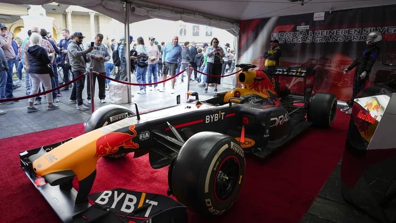 Nov 5, 2022; Las Vegas, Nevada, USA; Race fans view a car during the Formula One Las Vegas Grand Prix Launch Party at Las Vegas Strip. Mandatory Credit: Ray Acevedo-USA TODAY Sports