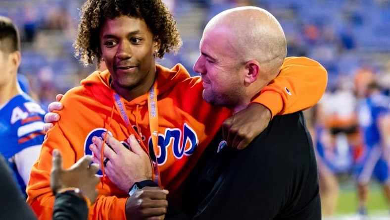 Florida Gators offensive coordinator Rob Sale hugs Florida Gators recruit Jaden Rashada after the game against the South Carolina Gamecocks at Steve Spurrier Field at Ben Hill Griffin Stadium in Gainesville, FL on Saturday, November 12, 2022. [Matt Pendleton/Gainesville Sun]

Ncaa Football Florida Gators Vs South Carolina Gamecocks