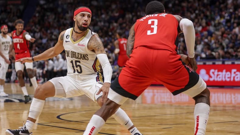 Nov 12, 2022; New Orleans, Louisiana, USA;  New Orleans Pelicans guard Jose Alvarado (15) guards Houston Rockets guard Kevin Porter Jr. (3) during the second half at Smoothie King Center. Mandatory Credit: Stephen Lew-USA TODAY Sports