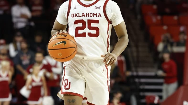 Nov 18, 2022; Norman, Oklahoma, USA; Oklahoma Sooners guard Grant Sherfield (25) dribbles against the South Alabama Jaguars in the second half at Lloyd Noble Center. Oklahoma won 64-60. Mandatory Credit: Alonzo Adams-USA TODAY Sports