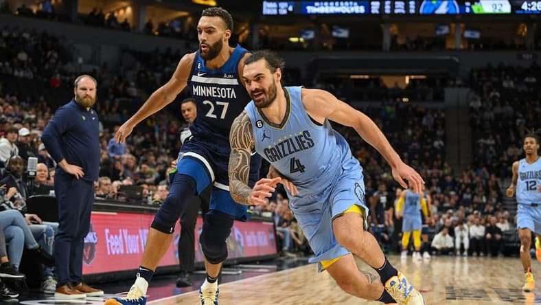 Nov 30, 2022; Minneapolis, Minnesota, USA; Minnesota Timberwolves center Rudy Gobert (27) and Memphis Grizzlies center Steven Adams (4) race after a loose ball during the fourth quarter at Target Center. Mandatory Credit: Nick Wosika-USA TODAY Sports