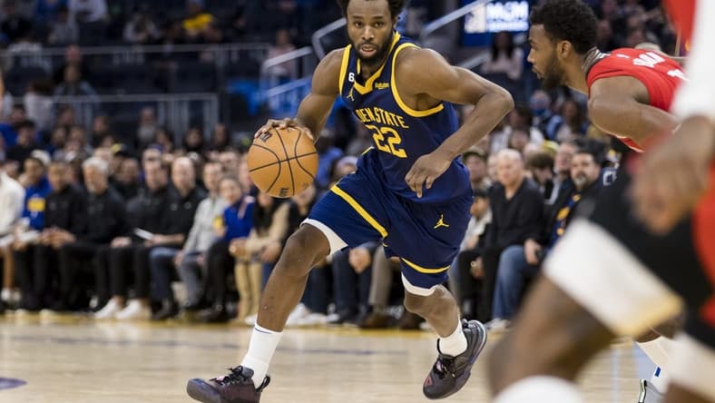 Dec 3, 2022; San Francisco, California, USA; Golden State Warriors forward Andrew Wiggins (22) dribbles the ball against the Houston Rockets during the second half at Chase Center. Mandatory Credit: John Hefti-USA TODAY Sports