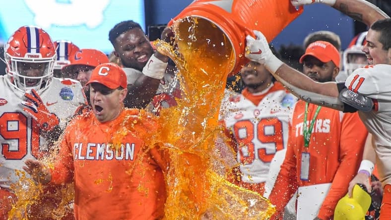 Clemson head coach Dabo Swinney gets dunked with sports drink by Clemson defensive lineman Bryan Bresee (11) during the fourth quarter of the ACC Championship football game at Bank of America Stadium in Charlotte, North Carolina Saturday, Dec 3, 2022.

Clemson Tigers Football Vs North Carolina Tar Heels Acc Championship Charlotte Nc