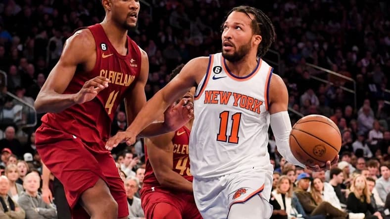 Dec 4, 2022; New York, New York, USA; New York Knicks guard Jalen Brunson (11) drives to the basket on Cleveland Cavaliers forward Evan Mobley (4) during the fourth quarter at Madison Square Garden. Mandatory Credit: Dennis Schneidler-USA TODAY Sports