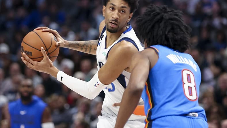 Dec 12, 2022; Dallas, Texas, USA; Dallas Mavericks forward Christian Wood (35) looks to score as Oklahoma City Thunder forward Jalen Williams (8) defends during the second half at American Airlines Center. Mandatory Credit: Kevin Jairaj-USA TODAY Sports