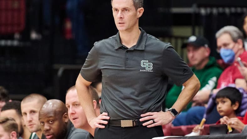 Dec 16, 2022; Stanford, California, USA; Green Bay Phoenix head coach Will Ryan watches the game against the Stanford Cardinal during the second half at Maples Pavilion. Mandatory Credit: Robert Edwards-USA TODAY Sports