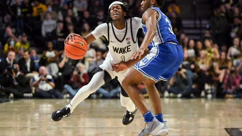 Dec 20, 2022; Winston-Salem, North Carolina, USA; Wake Forest Demon Deacons guard Tyree Appleby (1) is checked by Duke Blue Devils guard Jeremy Roach (3) during the second half at Lawrence Joel Veterans Memorial Coliseum. Mandatory Credit: William Howard-USA TODAY Sports