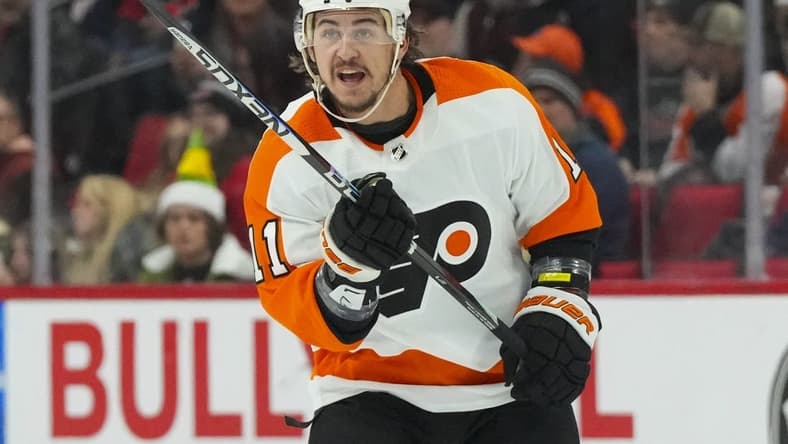 Dec 23, 2022; Raleigh, North Carolina, USA; Philadelphia Flyers right wing Travis Konecny (11) reacts against the Carolina Hurricanes during the first period at PNC Arena. Mandatory Credit: James Guillory-USA TODAY Sports
