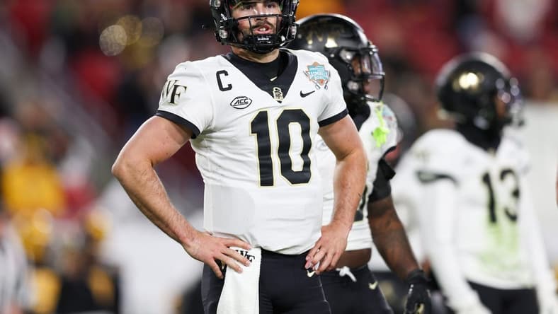 Dec 23, 2022; Tampa, Florida, USA; Wake Forest Demon Deacons quarterback Sam Hartman (10) waits for a play call against the Missouri Tigers during the second quarter in the 2022 Gasparilla Bowl at Raymond James Stadium. Mandatory Credit: Nathan Ray Seebeck-USA TODAY Sports