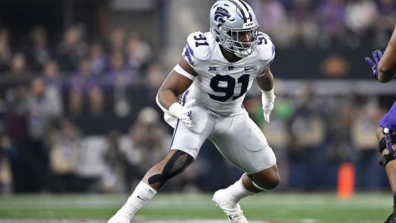 Dec 3, 2022; Arlington, TX, USA; Kansas State Wildcats defensive end Felix Anudike-Uzomah (91) in action during the game between the TCU Horned Frogs and the Kansas State Wildcats at AT&T Stadium. Mandatory Credit: Jerome Miron-USA TODAY Sports