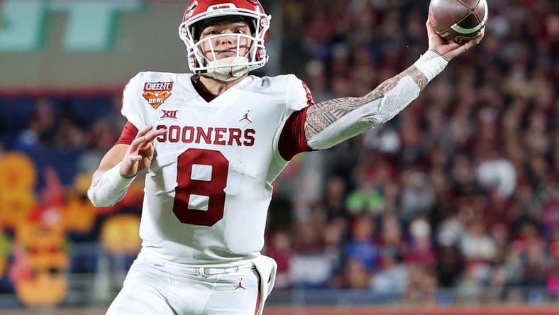 Dec 29, 2022; Orlando, Florida, USA; Oklahoma Sooners quarterback Dillon Gabriel (8) throws a pass against the Florida State Seminoles in the fourth quarter during the 2022 Cheez-It Bowl at Camping World Stadium. Mandatory Credit: Nathan Ray Seebeck-USA TODAY Sports