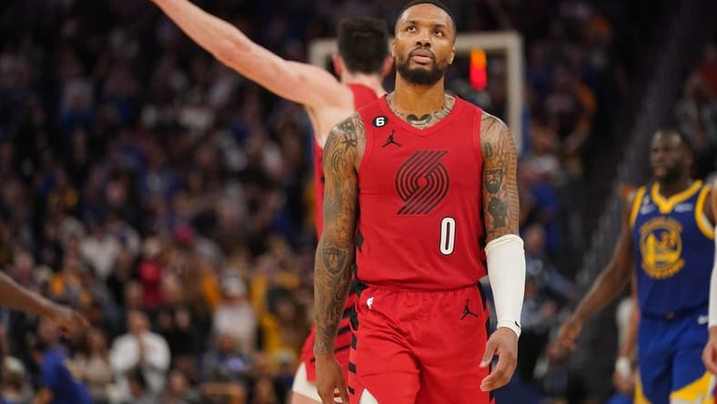 Dec 30, 2022; San Francisco, California, USA; Portland Trail Blazers guard Damian Lillard (0) reacts after committing a turnover against the Golden State Warriors in the fourth quarter at the Chase Center. Mandatory Credit: Cary Edmondson-USA TODAY Sports