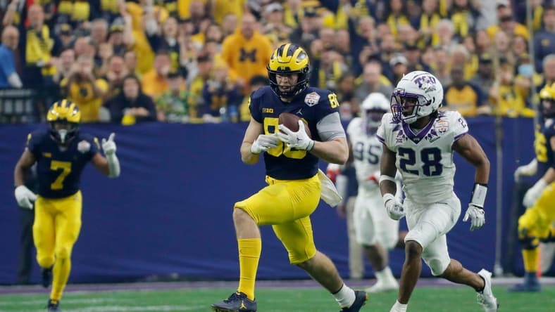 Michigan tight end Luke Schoonmaker (86) runs after a reception while TCU safety Millard Bradford (28) chases during the first quarter of the Fiesta Bowl on Saturday, Dec. 31 at State Farm Stadium in Glendale, Ariz.
2022-12-31-michigan-fiesta