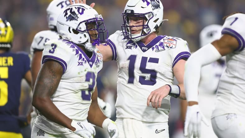 Dec 31, 2022; Glendale, Arizona, USA; TCU Horned Frogs running back Emari Demercado (3) celebrates after making a touchdown with quarterback Max Duggan (15) against the Michigan Wolverines in the third quarter of the 2022 Fiesta Bowl at State Farm Stadium. Mandatory Credit: Mark J. Rebilas-USA TODAY Sports