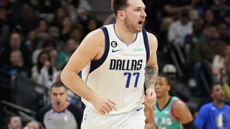 Dec 31, 2022; San Antonio, Texas, USA; Dallas Mavericks guard Luka Doncic (77) reacts after scoring a three point basket against the San Antonio Spurs during the first half at AT&T Center. Mandatory Credit: Scott Wachter-USA TODAY Sports
