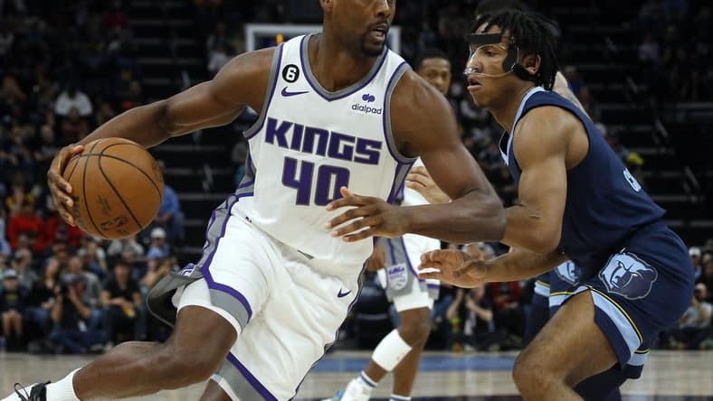 Jan 1, 2023; Memphis, Tennessee, USA; Sacramento Kings forward Harrison Barnes (40) drives to the basket as Memphis Grizzlies guard Kennedy Chandler (1) defends during the first half at FedExForum. Mandatory Credit: Petre Thomas-USA TODAY Sports