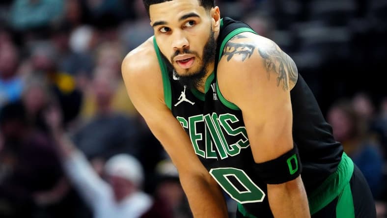 Jan 1, 2023; Denver, Colorado, USA; Boston Celtics forward Jayson Tatum (0) during the second quarter against the Denver Nuggets at Ball Arena. Mandatory Credit: Ron Chenoy-USA TODAY Sports