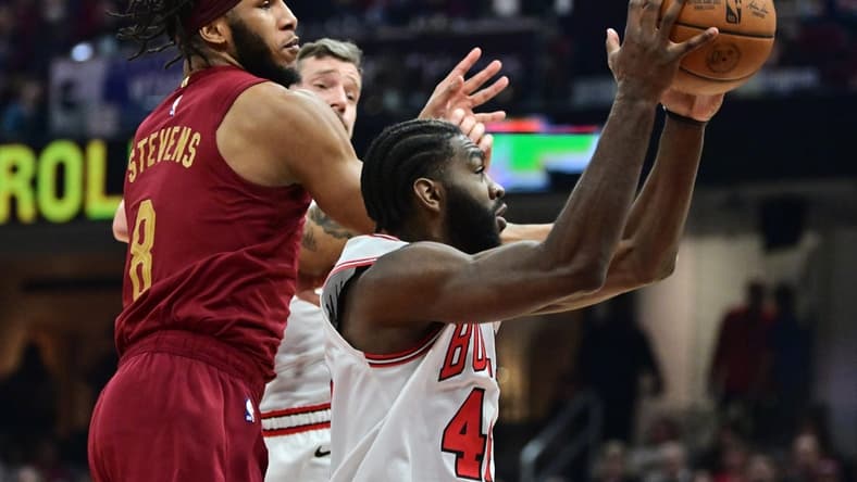 Jan 2, 2023; Cleveland, Ohio, USA; Chicago Bulls forward Patrick Williams (44) grabs a rebound ahead of Cleveland Cavaliers forward Lamar Stevens (8) during the first half at Rocket Mortgage FieldHouse. Mandatory Credit: Ken Blaze-USA TODAY Sports