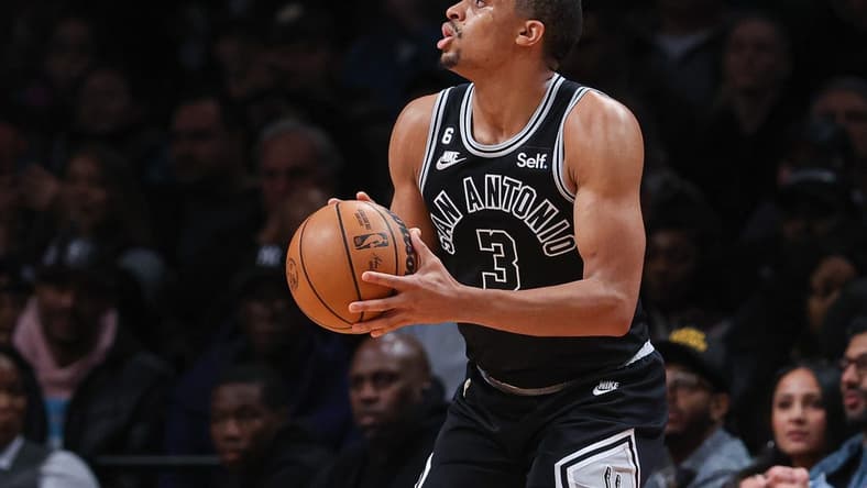 Jan 2, 2023; Brooklyn, New York, USA; San Antonio Spurs forward Keldon Johnson (3) shoots a three point basket during the first half against the Brooklyn Nets at Barclays Center. Mandatory Credit: Vincent Carchietta-USA TODAY Sports
