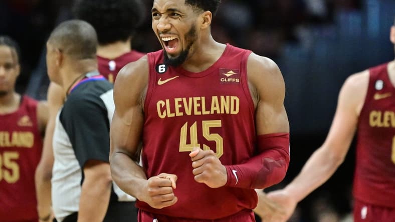 Jan 2, 2023; Cleveland, Ohio, USA; Cleveland Cavaliers guard Donovan Mitchell (45) reacts after a basket during the second half against the Chicago Bulls at Rocket Mortgage FieldHouse. Mitchell set the franchise record for points with 71. Mandatory Credit: Ken Blaze-USA TODAY Sports