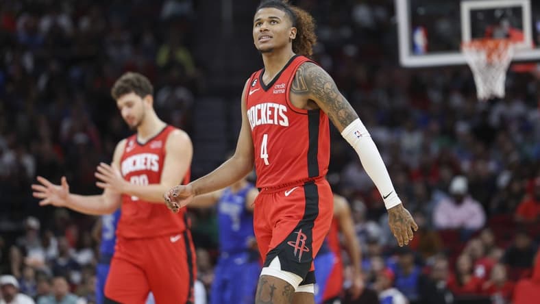Jan 2, 2023; Houston, Texas, USA; Houston Rockets guard Jalen Green (4) and center Alperen Sengun (28) react during the fourth quarter against the Dallas Mavericks at Toyota Center. Mandatory Credit: Troy Taormina-USA TODAY Sports
