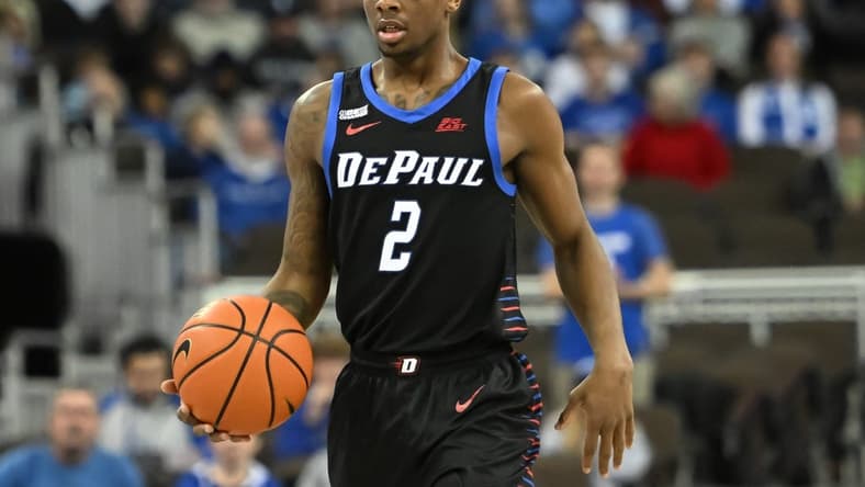 Dec 25, 2022; Omaha, Nebraska, USA; DePaul Blue Demons guard Umoja Gibson (2) dribbles against the Creighton Bluejays in the first half at CHI Health Center Omaha. Mandatory Credit: Steven Branscombe-USA TODAY Sports