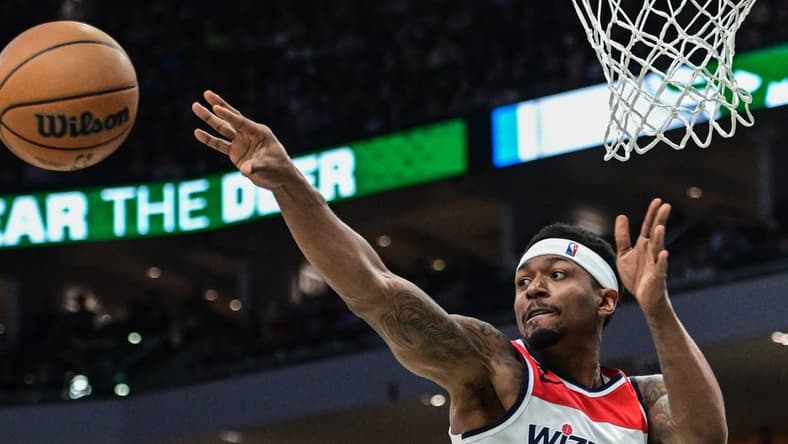 Jan 3, 2023; Milwaukee, Wisconsin, USA; Washington Wizards guard Bradley Beal (3) passes in the second quarter during game against the Milwaukee Bucks at Fiserv Forum. Mandatory Credit: Benny Sieu-USA TODAY Sports