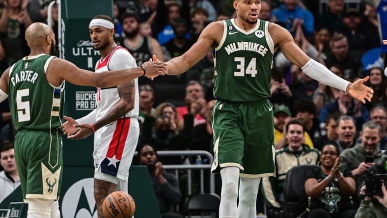 Jan 3, 2023; Milwaukee, Wisconsin, USA; Milwaukee Bucks forward Giannis Antetokounmpo (34) reacts after scoring a basket in the second quarter during game against the Washington Wizards at Fiserv Forum. Mandatory Credit: Benny Sieu-USA TODAY Sports