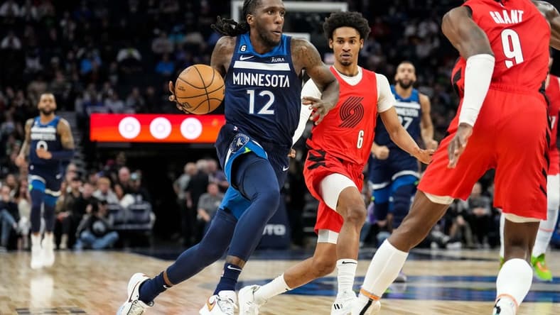 Jan 4, 2023; Minneapolis, Minnesota, USA; Minnesota Timberwolves forward Taurean Prince (12) drives to the basket during the second quarter against the Portland Trail Blazers at Target Center. Mandatory Credit: Brace Hemmelgarn-USA TODAY Sports